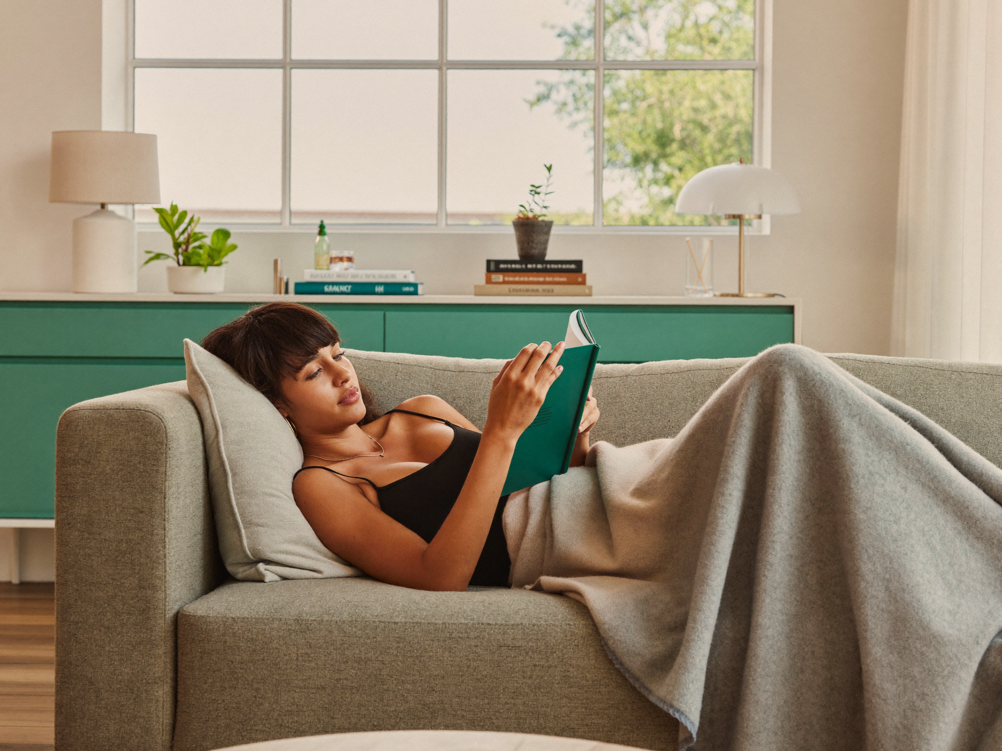 A woman relaxing comfortably at home during recovery